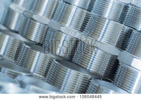 Threaded fasteners deposited in layers as a base
