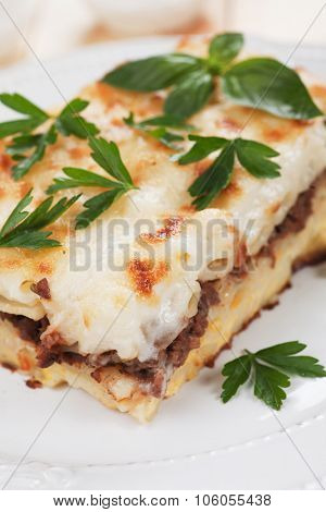 Pasticcio or pastitsio with ground beef and bechamel sauce, italian baked pasta