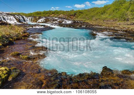The turquoise water of Bruarfoss