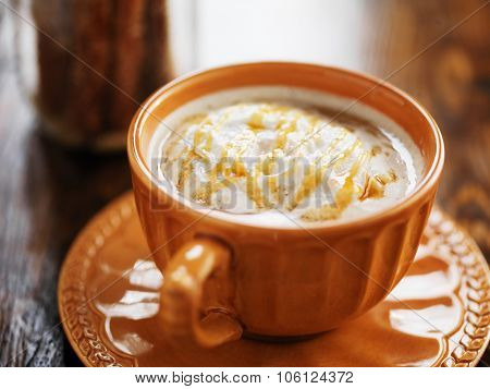 caramel pumpkin spice latte with cream