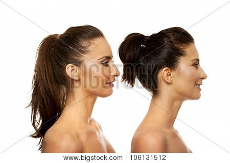 Beauty woman with make up standing behind her friend.
