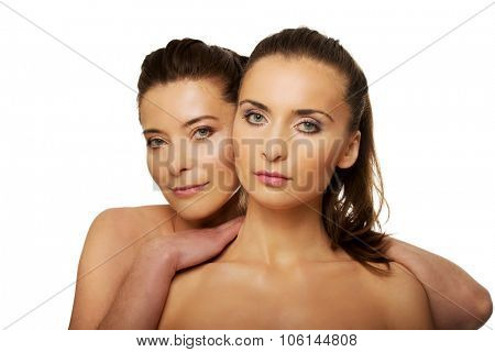 Two attractive sisters with make up.