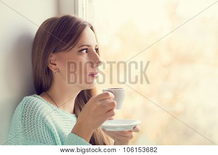 Pretty Young Woman Drinking Espresso