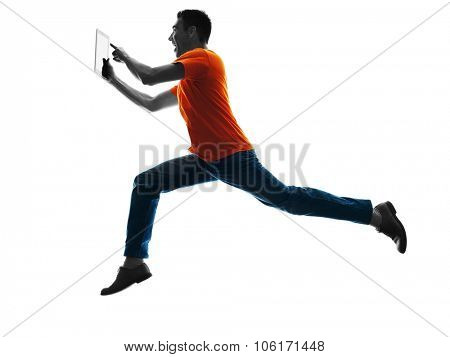 one causcasian man running Digital Tablets  in silhouette isolated on white background