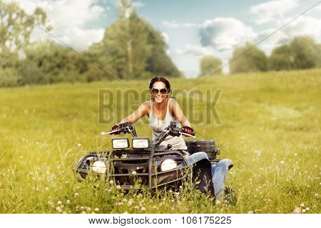 Elegant Woman Riding Quadrocycle