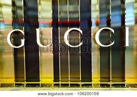 DUBAI - SEPTEMBER 08, 2015: Gucci store in Dubai Airport. Gucci is an Italian fashion and leather goods brand, part of the Gucci Grou