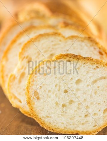The Sliced Bread On A Wood Background, Warm Toning, Selective Focus