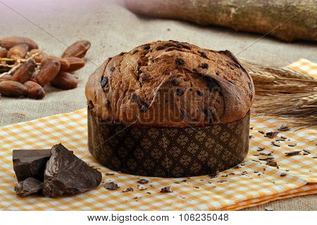 Panettone bread and ingredients on rustic wood ambient.Panetone and ingredients.Traditional christmas food.