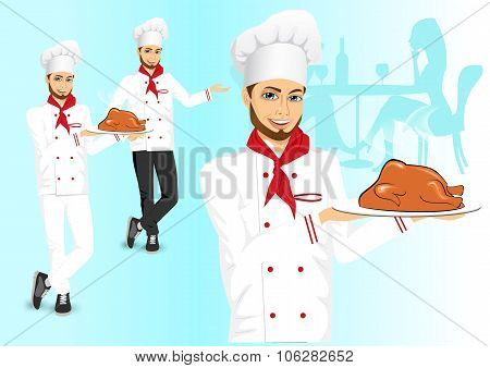 male chef holding a tray with christmas roasted turkey