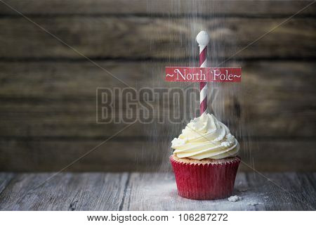 Cupcake with North Pole sign