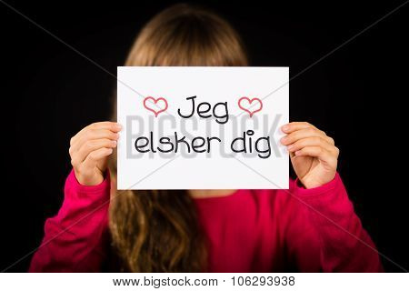 Child Holding Sign With Danish Words Jeg Elsker Dig - I Love You