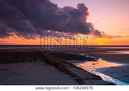 Low Tide On The Beach In Rumpside,great Britain