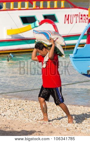 Men Transports Cargo From Ship
