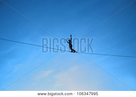 Men Balancing on Slackline