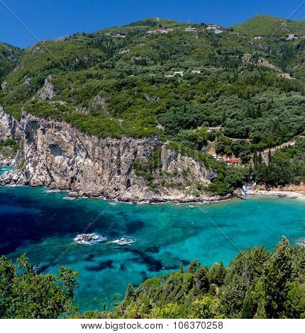 Beautiful Bay With Crystal Clear Water, Rocks And Mountains With Vegetation, Corfu, Greece