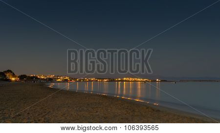 Night view of Golden beach or Xrisi Akti in Paros island in Greece.