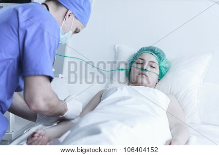 Surgeon Injecting Ill Woman