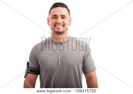 Attractive Athlete Listening To Music