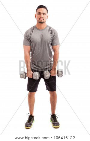 Hispanic Man Lifting Dumbbells