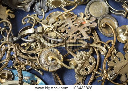 Bunch Of Many Old Brass Door Mountings On A Flea Market