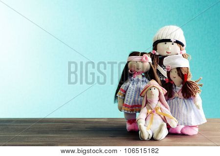 Dolls on blue background