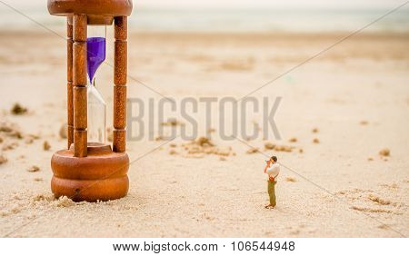 Mini Figure Dolls Photographer Take Picture On Sandglass