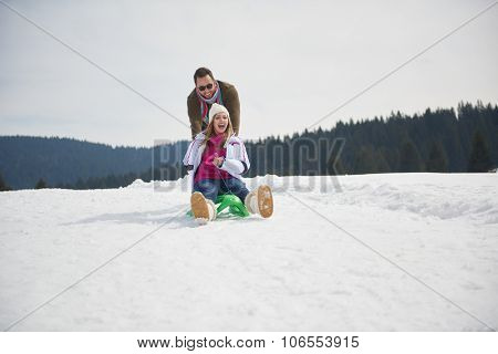 romantic winter  scene, happy young couple having fun on fresh show on winter vacatio, mountain nature landscape