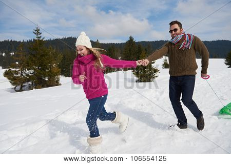 romantic winter  scene, happy young couple having fun on fresh show on winter vacatio, mountain nature landscape