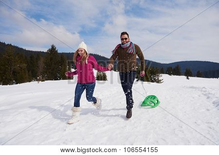 romantic winter  scene, happy young couple having fun on fresh show on winter vacatio, mountain nature landscape