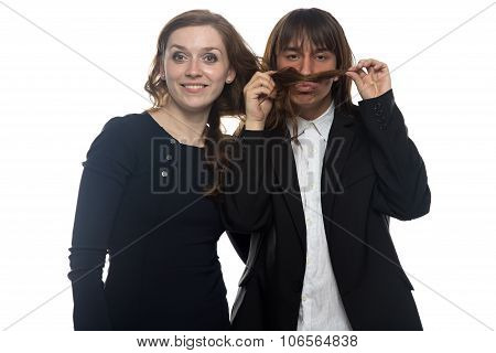 Woman and man in black jacket snuffing her hair