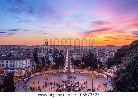 Cityscape Of Rome, Italy At Sunset, With Piazza Del Popolo Lit By Street Lanterns