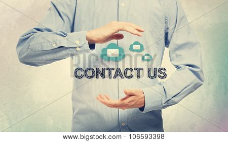 Young Man Holding Contact Us