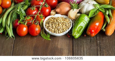 Spelt In A Bowl And Fresh Vegetables