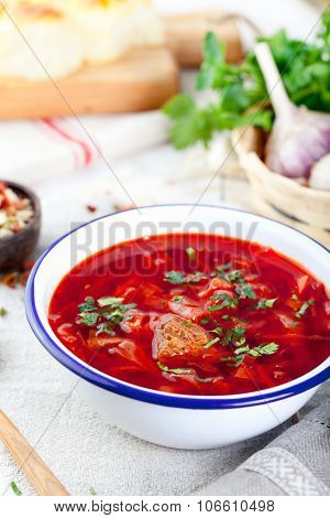 Traditional Ukrainian Russian vegetable soup, borsch with garlic donuts, pampushki.