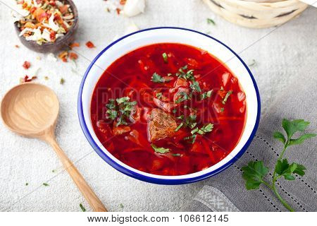 Traditional Ukrainian Russian vegetable soup, borsch with garlic donuts, pampushki.