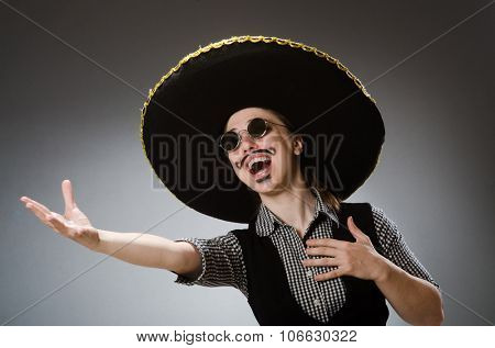 Person wearing sombrero hat in funny concept