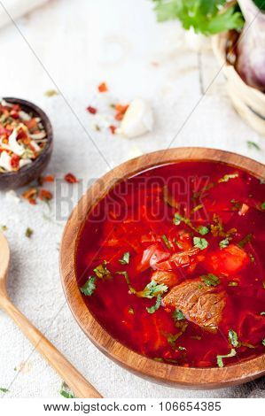 Traditional Ukrainian Russian vegetable soup, borsch with garlic donuts, pampushki .