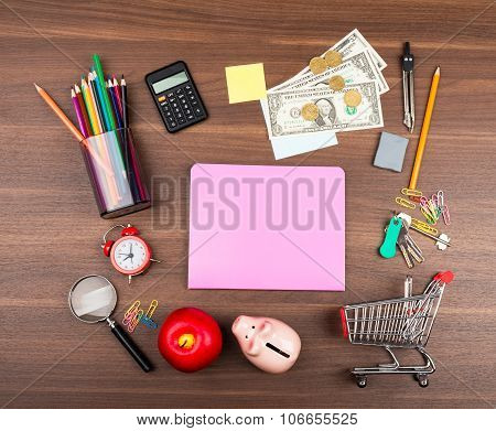 Shopping cart with pink copybook