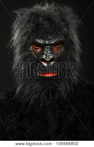 Portrait of a man with gorilla costume