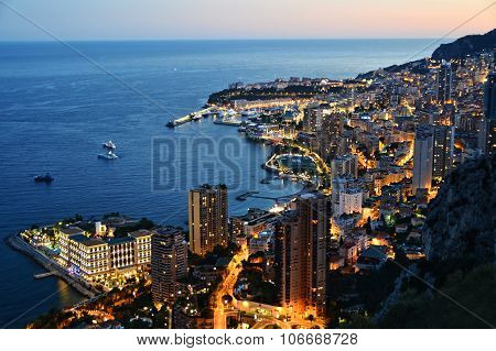 View Of The City Of Monaco By Night. French Riviera