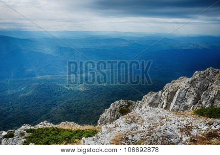 View From A High Cliff On The Forest And Mountains
