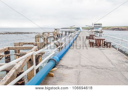 Old And New Piers At The Harbor At Doornbaai