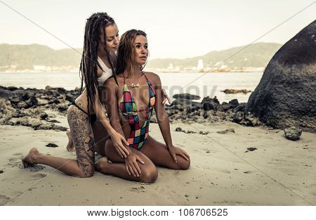 Two Hot Models Posing On The Beach