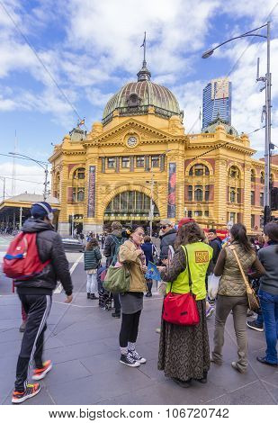 Vendor selling magazines to customers in Melbourne