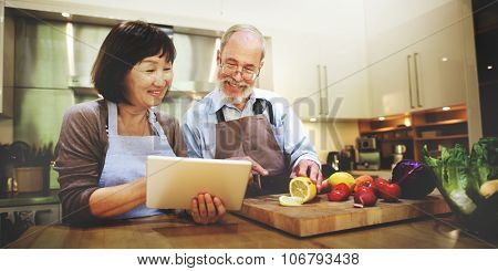 Husband Wife Cooking Searching Menu Tablet Concept