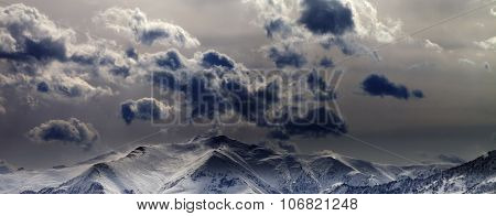 Panoramic View On Evening Mountains And Cloudy Sky