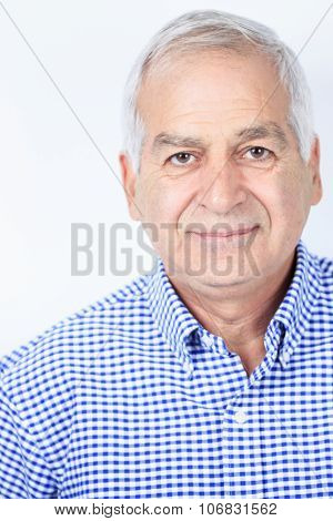 Happy Mature Man in gray background