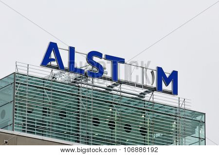 BADEN, SWITZERLAND. November 2nd 2015. Alstom logo on rooftop of thermal power headquarters being removed for merger and acquisition of General Electric.
