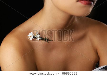 View on woman's neck, collarbone and shoulders, close-up