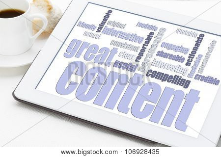 great content word cloud on a digital tablet with a cup of coffee - bloging and content marketing concept